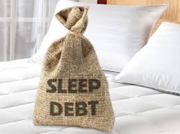 canvas bag with the words sleep debt printed on it