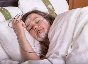 patient sleeping at sleep clinic